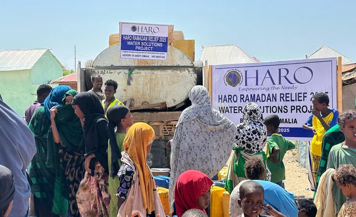 A HARO water tanker carrying a Ramadan Relief 2025 banner delivers emergency water